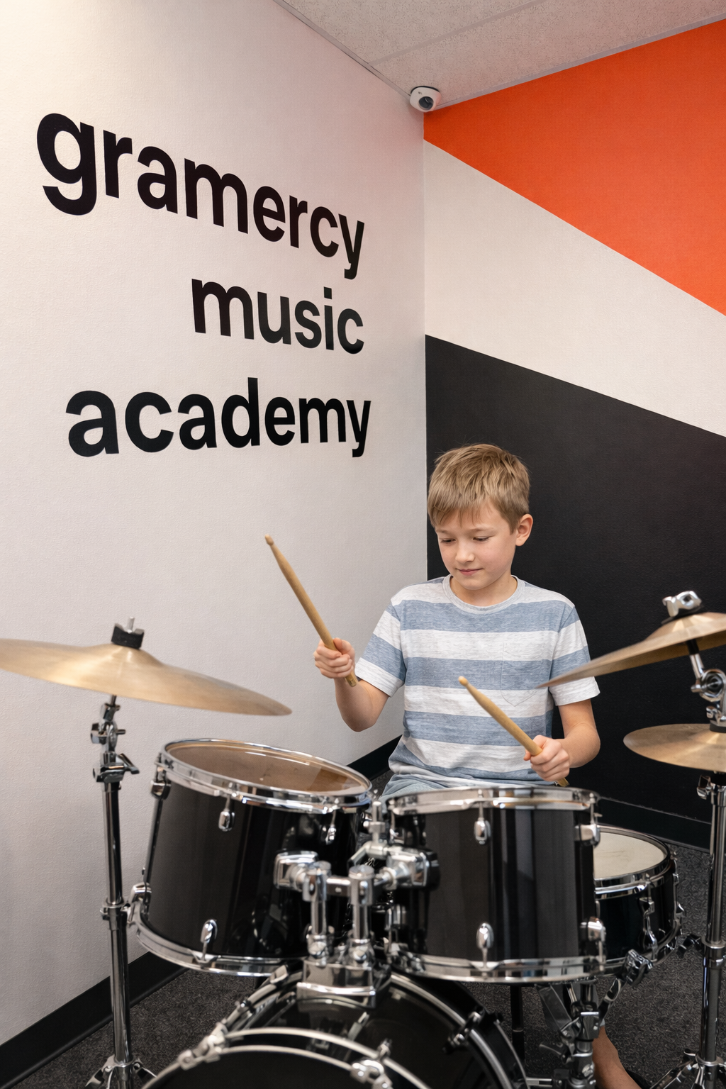 a boy playing the drums