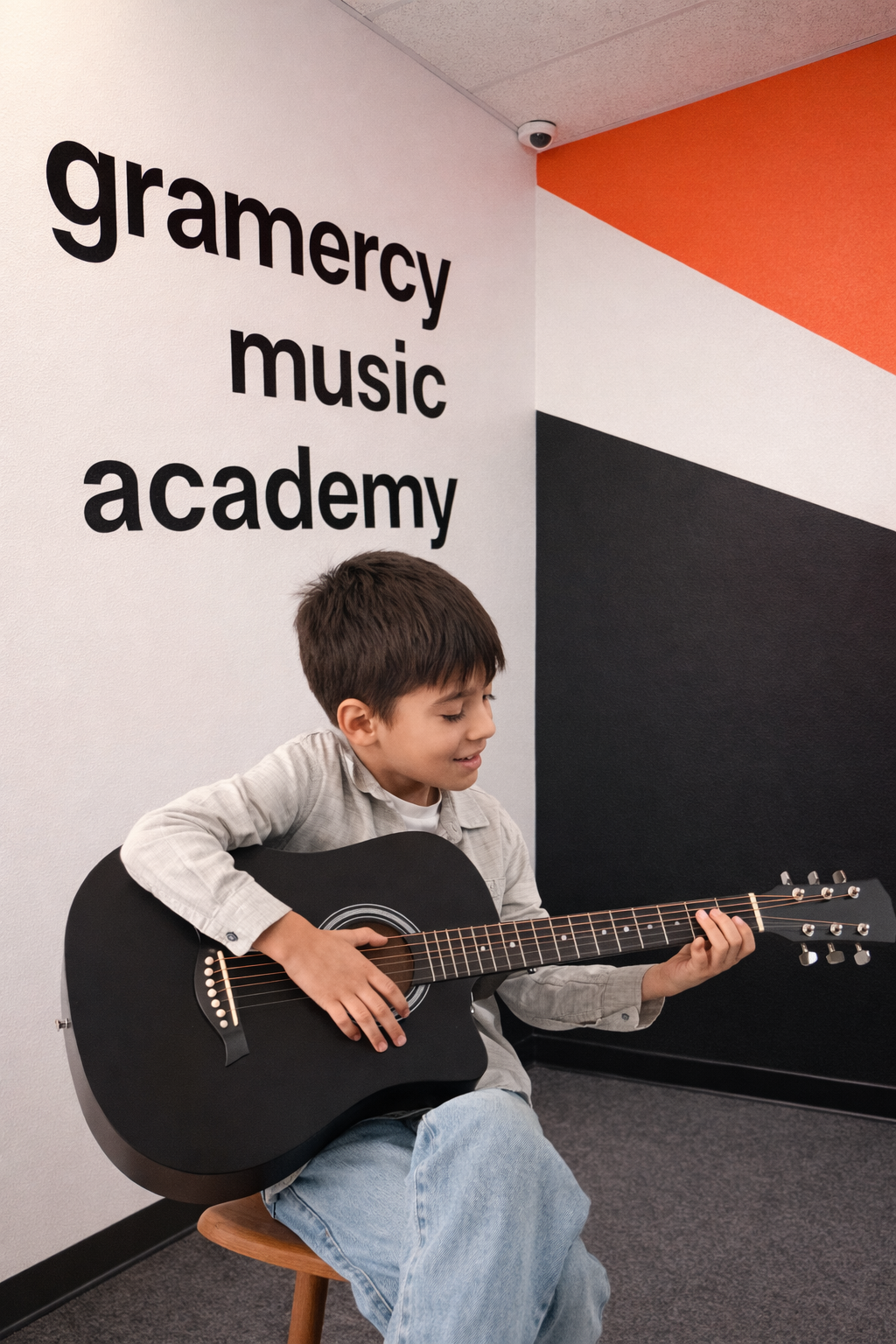 boy playing the guitar