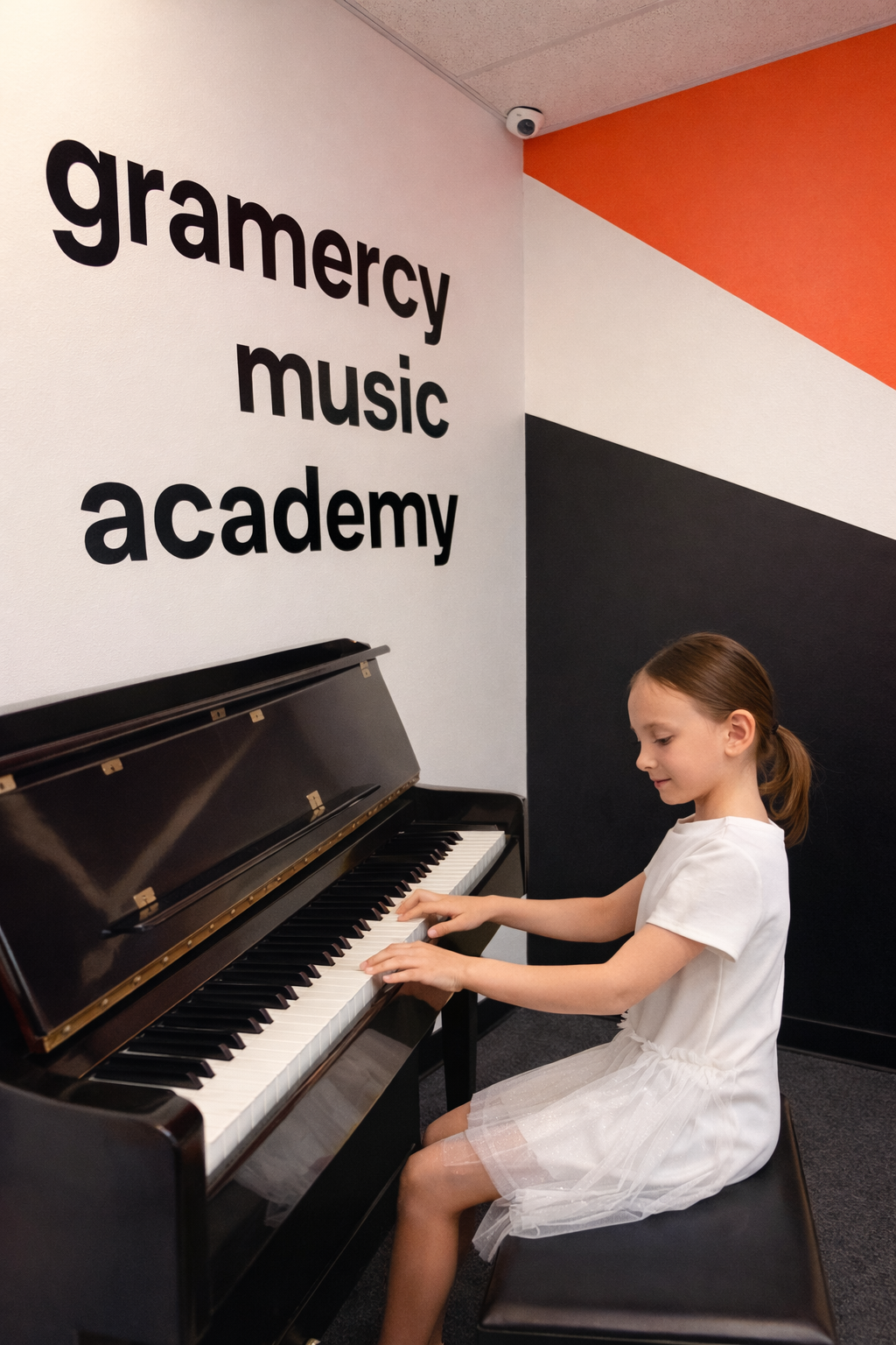 young girl playing the piano at gramercy